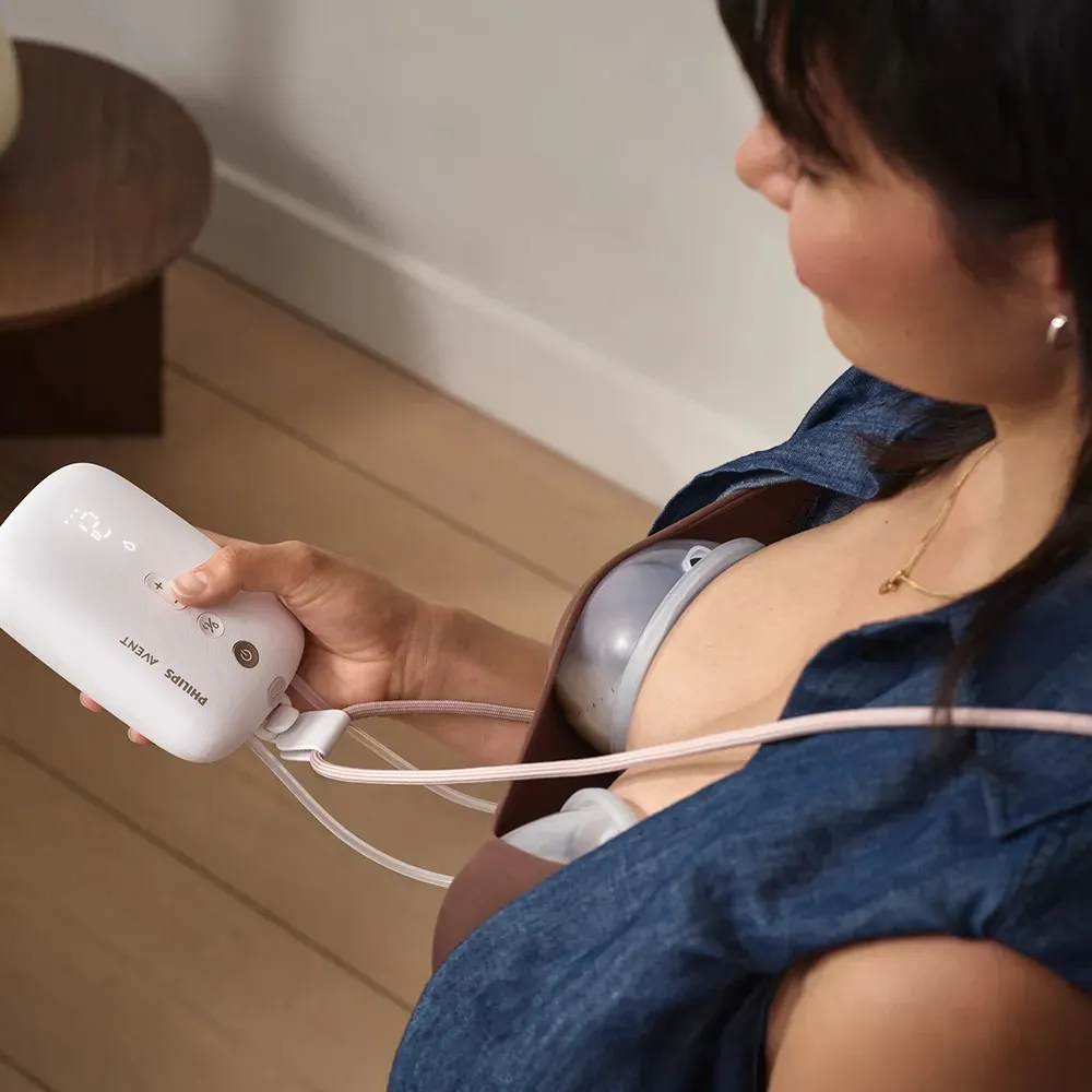 https://www.roshko.bg/media/catalog/product/cache/1/image/9df78eab33525d08d6e5fb8d27136e95/0/0/Philips AVENT Двойна електрическа помпа Hands-free.webp
