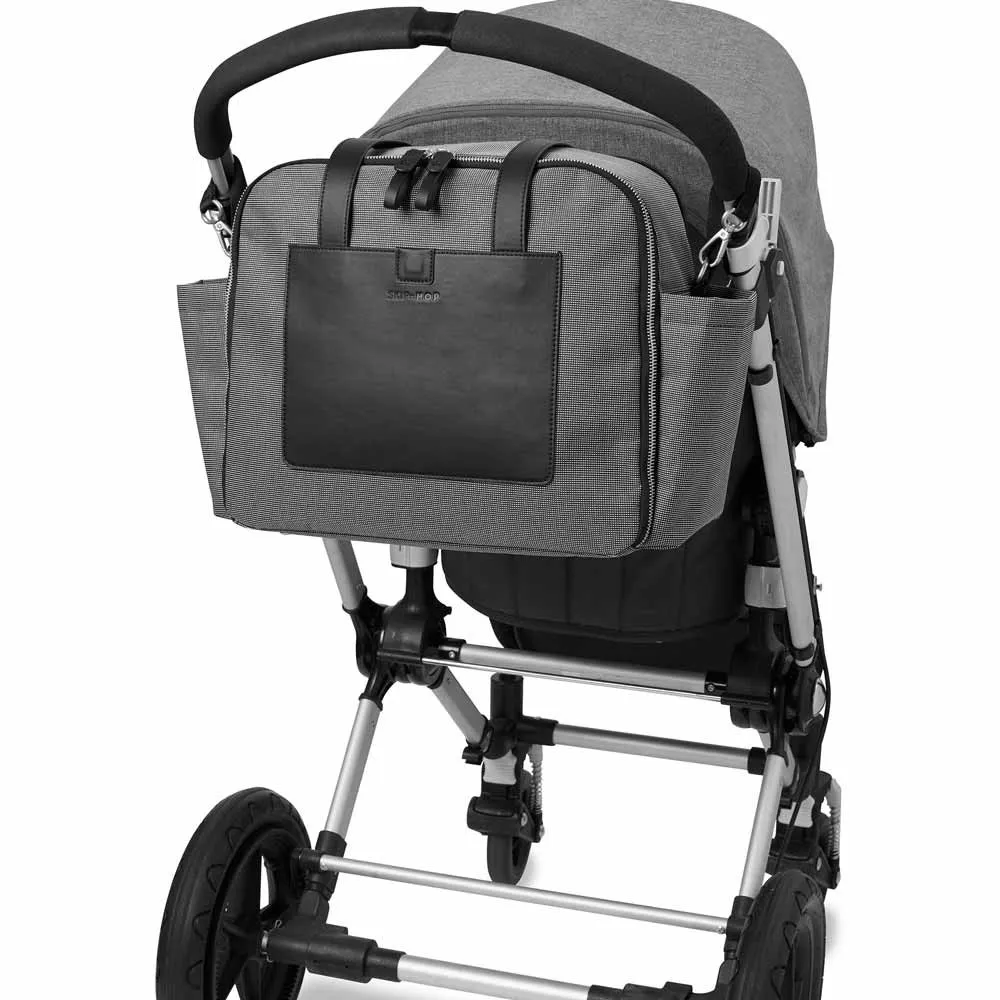 https://www.roshko.bg/media/catalog/product/cache/1/image/9df78eab33525d08d6e5fb8d27136e95/2/0/Skip Hop Madison Square Diaper Tote чанта за детска количка 5.webp
