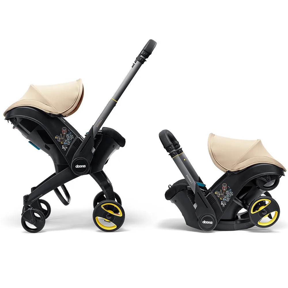 https://www.roshko.bg/media/catalog/product/cache/1/image/9df78eab33525d08d6e5fb8d27136e95/2/_/Doona™ i-size Седалка с шаси 2 в 1 - Sahara Sand.webp