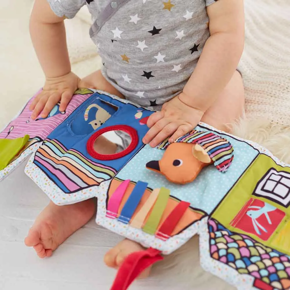https://www.roshko.bg/media/catalog/product/cache/1/image/9df78eab33525d08d6e5fb8d27136e95/3/0/Skip Hop Vibrant Village Peek & Play Activity Book мека книжка Веселото село 4.webp