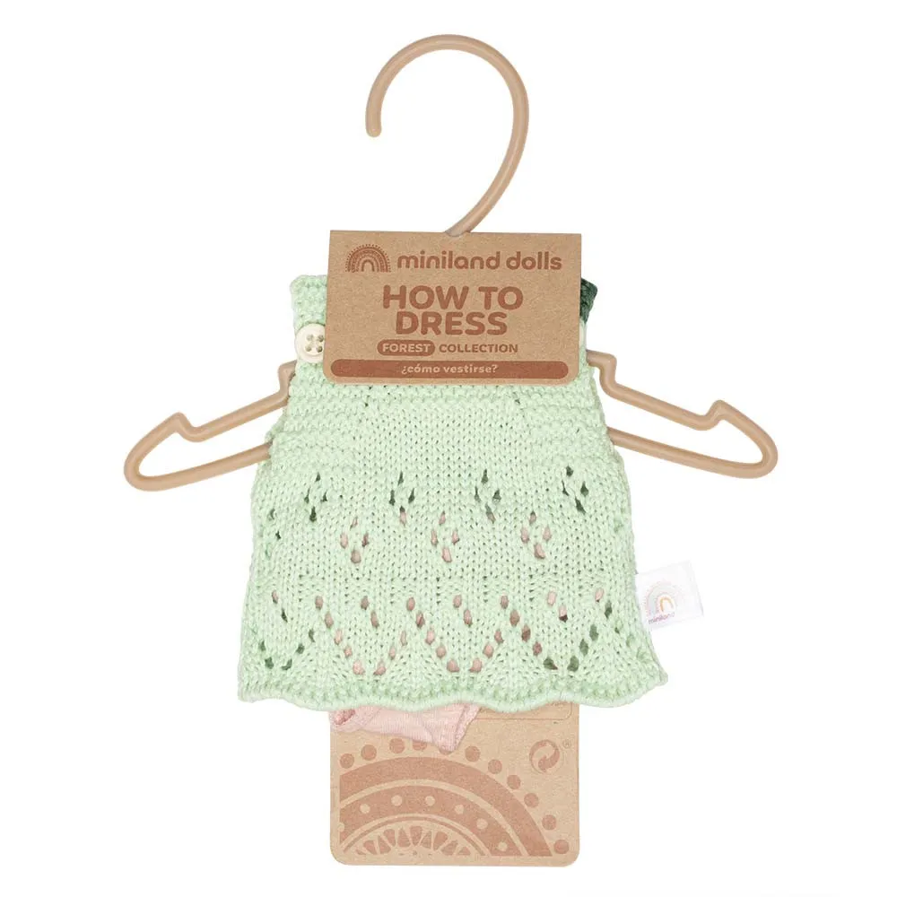 https://www.roshko.bg/media/catalog/product/cache/1/image/9df78eab33525d08d6e5fb8d27136e95/3/1/Miniland Baby кукла момиченце 21 см с плетен сукман 3.webp