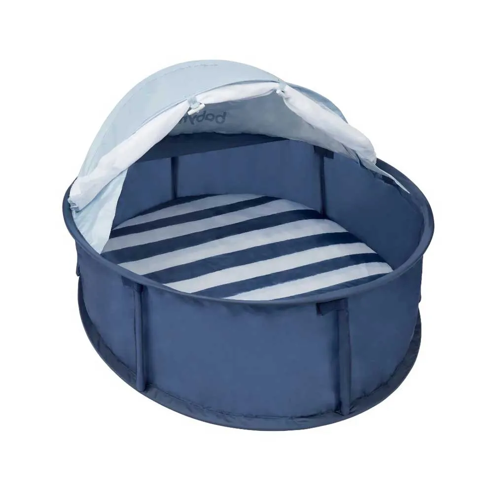 https://www.roshko.bg/media/catalog/product/cache/1/image/9df78eab33525d08d6e5fb8d27136e95/3/2/Babymoov Babyni малка сгъваема кошара с с UV фактор 50+ - Marine.webp