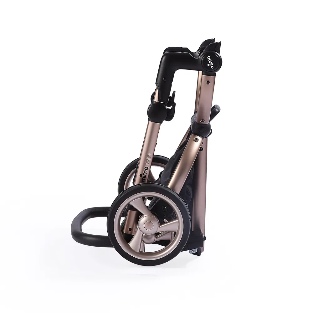 https://www.roshko.bg/media/catalog/product/cache/1/image/9df78eab33525d08d6e5fb8d27136e95/3/_/Mima Детска количка Xari White 2в1.webp