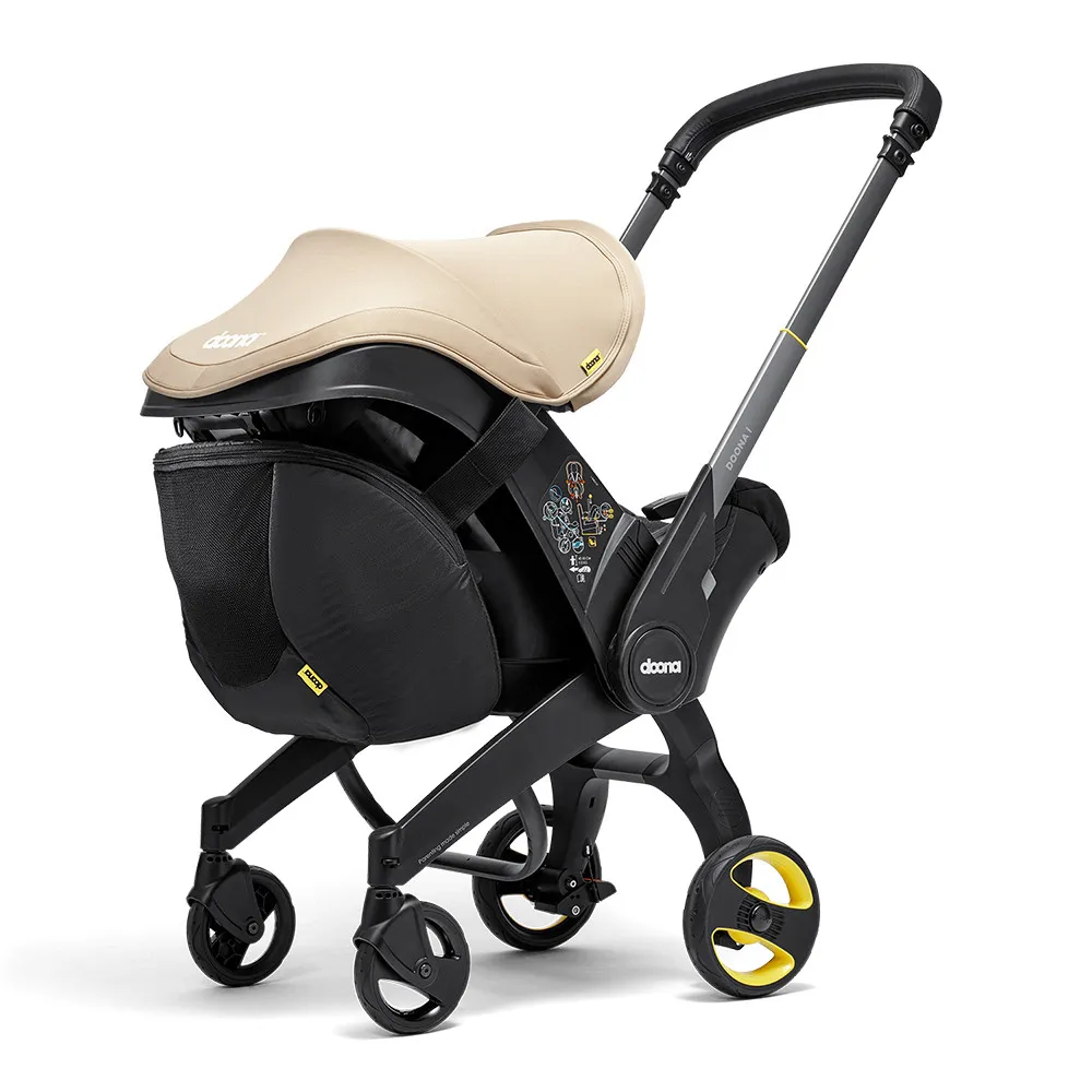 https://www.roshko.bg/media/catalog/product/cache/1/image/9df78eab33525d08d6e5fb8d27136e95/5/_/Doona™ Snap on storage чанта за детска количка.webp