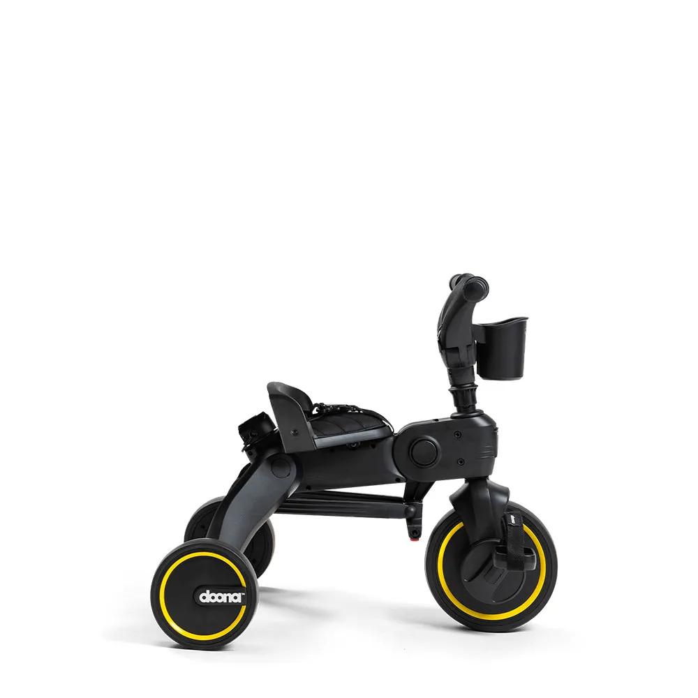 https://www.roshko.bg/media/catalog/product/cache/1/image/9df78eab33525d08d6e5fb8d27136e95/7/-/Doona™ Liki Trike S5 Delux детска триколка - Midnight Limited Edition.webp