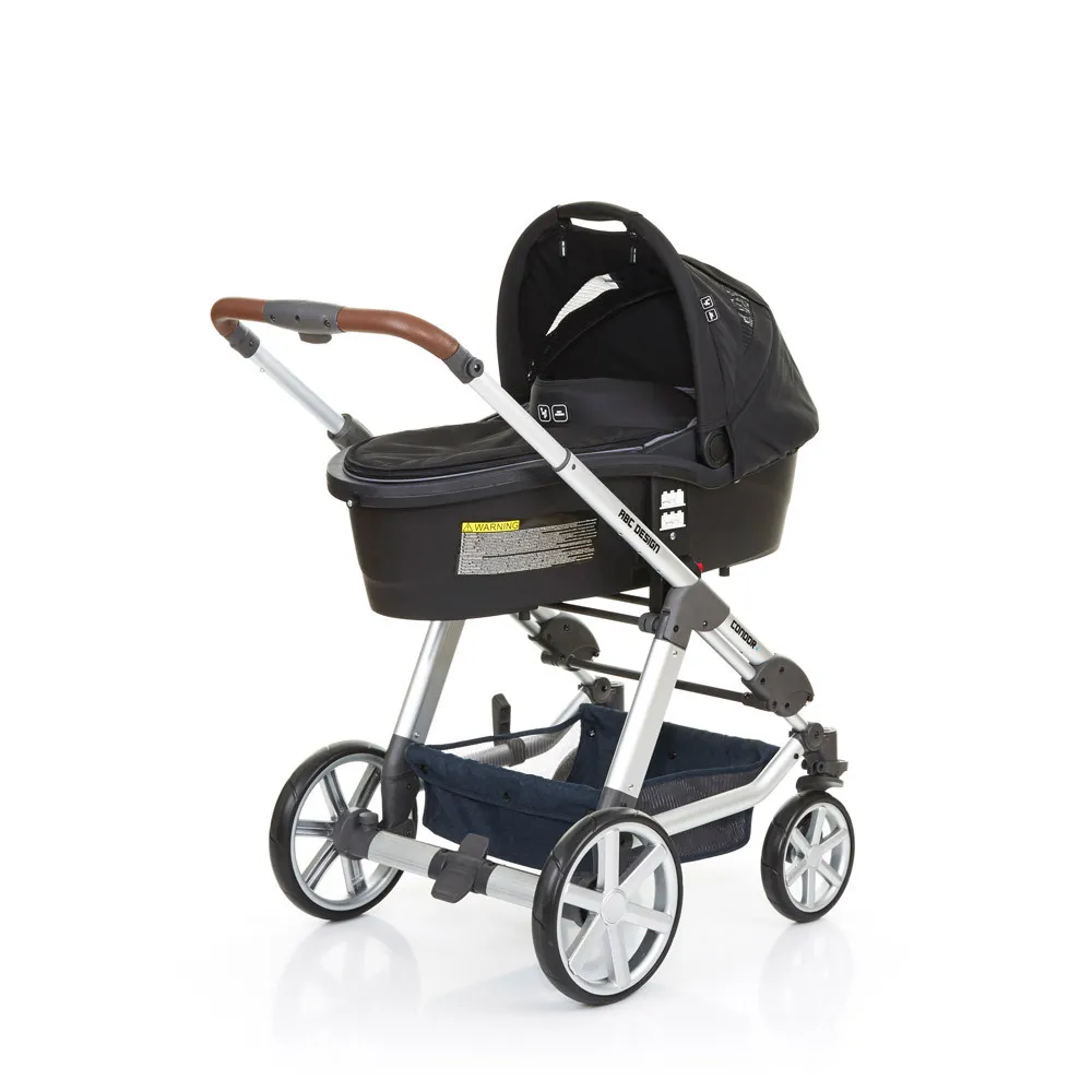 https://www.roshko.bg/media/catalog/product/cache/1/image/9df78eab33525d08d6e5fb8d27136e95/c/o/ABC Design количка CONDOR 4 с кош за новородено и лятна седалка admiral 2017.webp