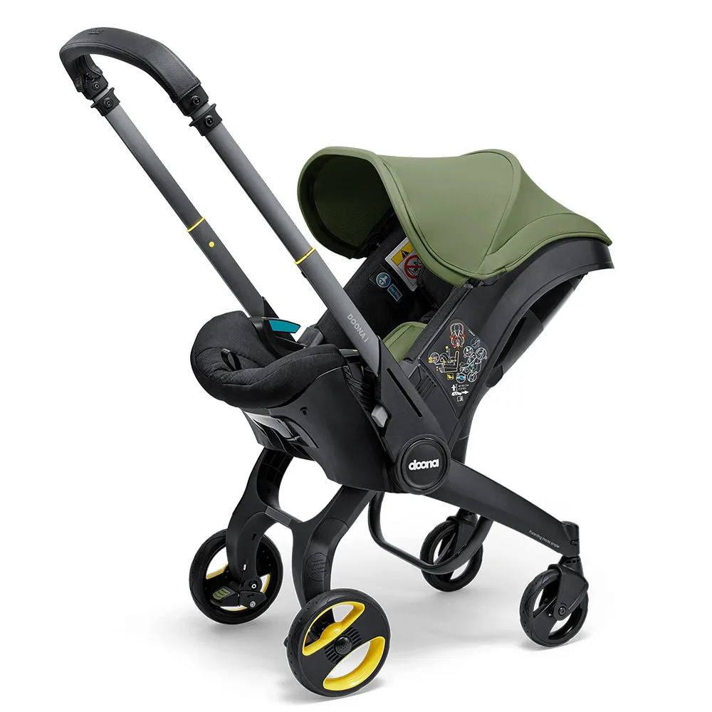 https://www.roshko.bg/media/catalog/product/cache/1/image/9df78eab33525d08d6e5fb8d27136e95/d/o/Doona™ i-size Седалка с шаси 2 в 1 - Desert Green.webp