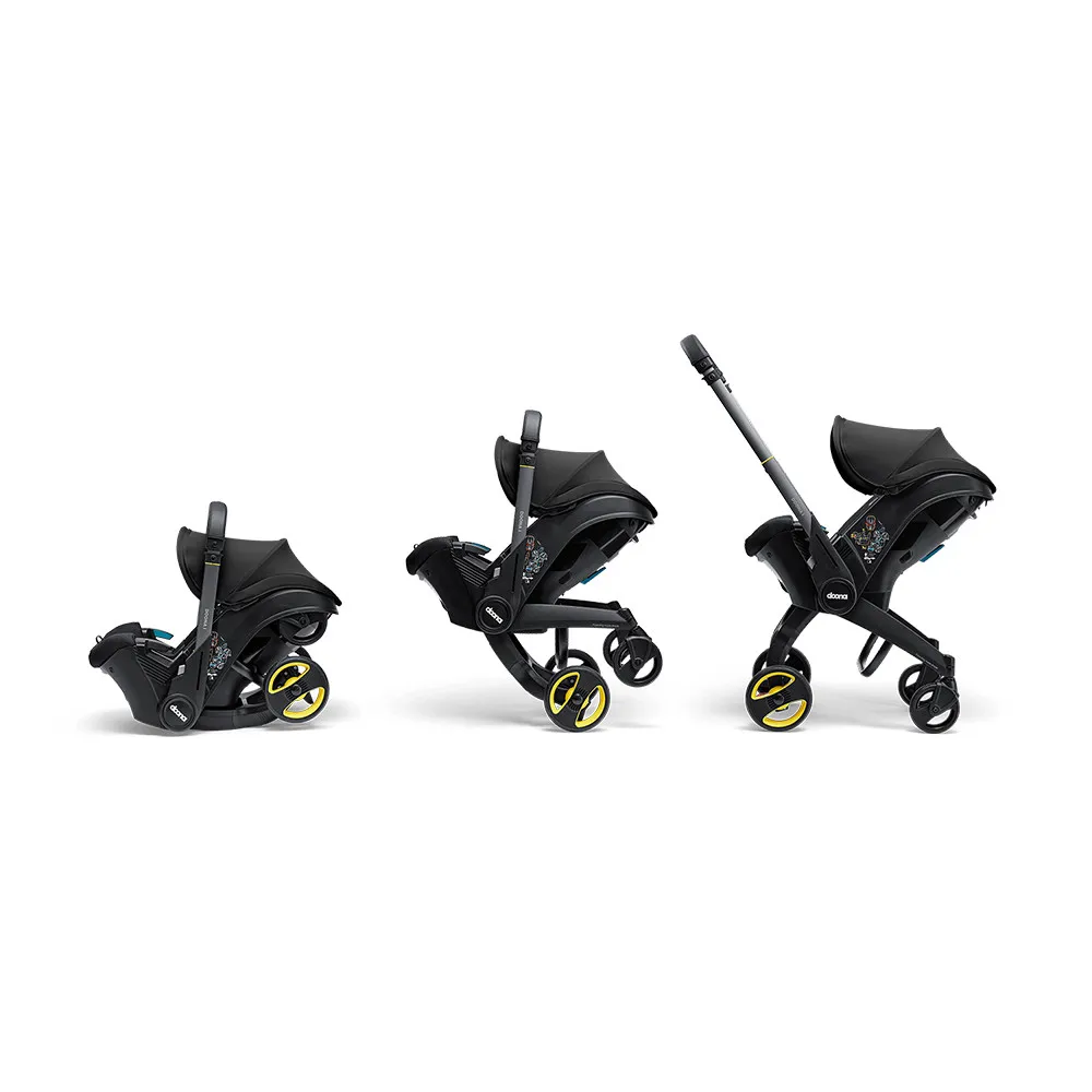 https://www.roshko.bg/media/catalog/product/cache/1/image/9df78eab33525d08d6e5fb8d27136e95/d/o/Doona™ i-size Седалка с шаси 2 в 1 - Nitro Black.webp