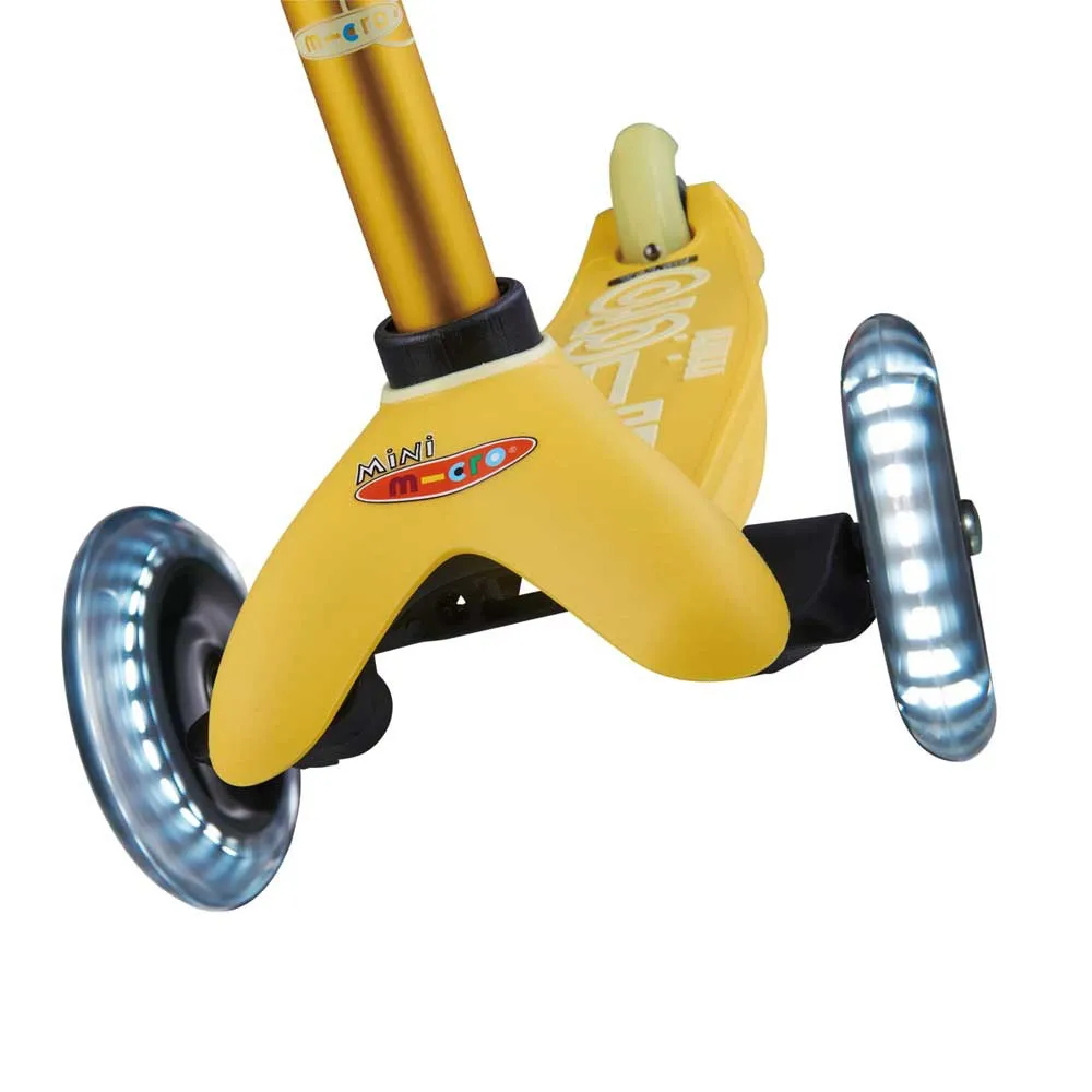 https://www.roshko.bg/media/catalog/product/cache/1/image/9df78eab33525d08d6e5fb8d27136e95/l/a/Micro Mini Deluxe Yellow LED тротинетка  2.webp