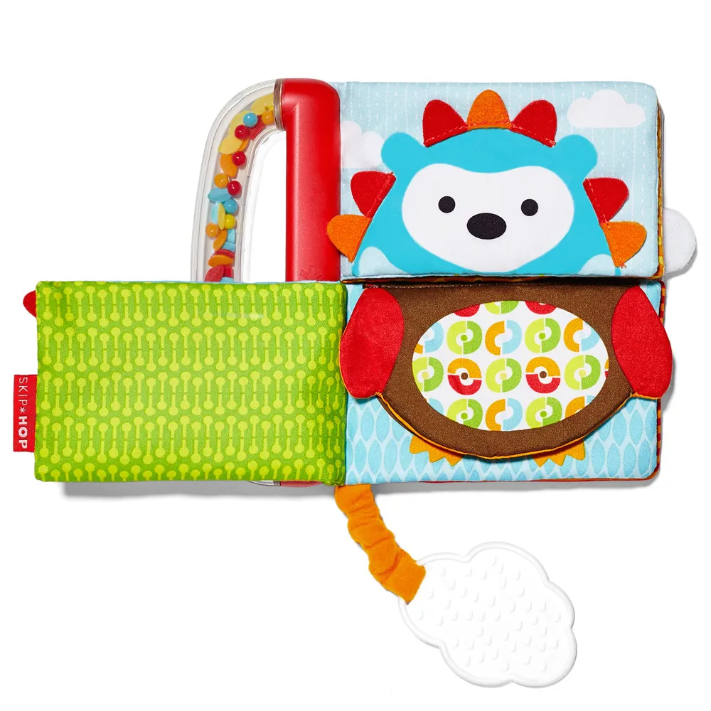 https://www.roshko.bg/media/catalog/product/cache/1/image/9df78eab33525d08d6e5fb8d27136e95/l/g/Skip Hop Мека книжка с дрънкалка и гризалка.webp