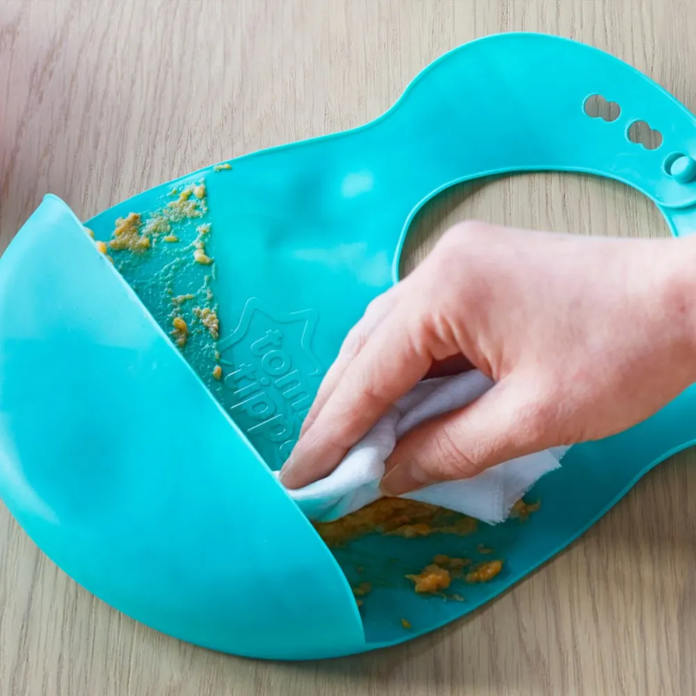 https://www.roshko.bg/media/catalog/product/cache/1/image/9df78eab33525d08d6e5fb8d27136e95/m/e/Tommee Tippee Мек силиконов лигавник Roll n Go, тюркоаз.webp