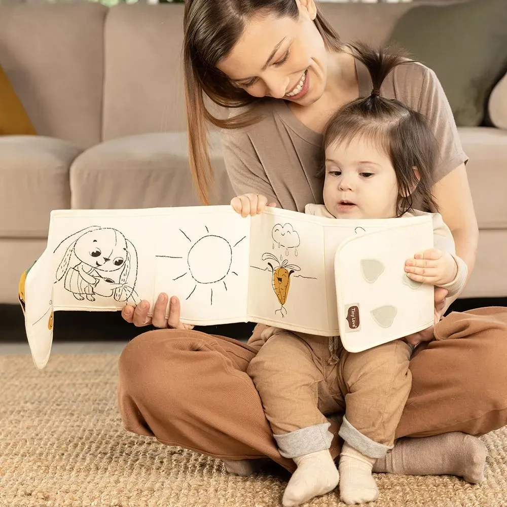 https://www.roshko.bg/media/catalog/product/cache/1/image/9df78eab33525d08d6e5fb8d27136e95/t/l/Tiny Love Мека двулицева книжка-обиколник от Еко серията Garden of Adventures.webp